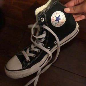 black high top sneakers. converse.